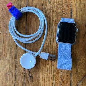 Apple Smartwatch with Blue Band and Silver Case